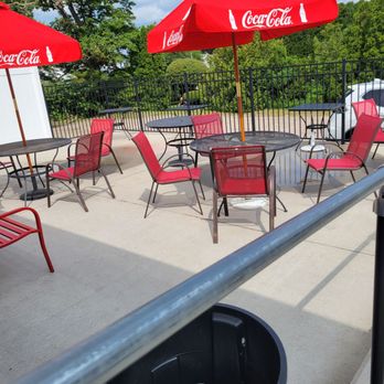 Midway Pizza House - tables and chairs with red umbrellas - Pizza Near Me - Westerly, Rhode Island Midway Pizza House - tables and chairs with red umbrellas - Pizza Near Me - Westerly, Rhode Island
