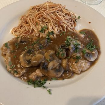 Cappuccino Italian Bistro - Veal Parmigiana with angel hair pasta. Delicious! - Italian Near Me - Richardson, Texas Cappuccino Italian Bistro - Veal Parmigiana with angel hair pasta. Delicious! - Italian Near Me - Richardson, Texas