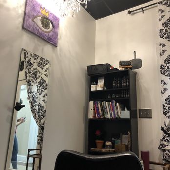 Khemistree Naturals - Stylist chair and product shelf - Hair Salons Near Me - Charlotte, North Carolina