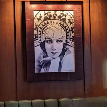 The Backdoor - a portrait of a woman in a headdress - Mexican Near Me - Rochester, Michigan