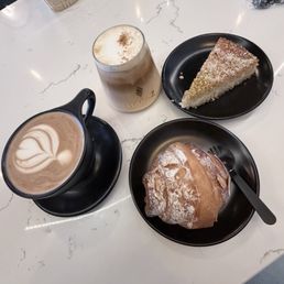 Hot mocha latte, iced pumpkin latte, almond croissant & unknown dessert