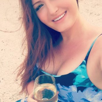 Merroir - Happy guest with their Riesling - Seafood Near Me - Topping, Virginia Merroir - Happy guest with their Riesling - Seafood Near Me - Topping, Virginia