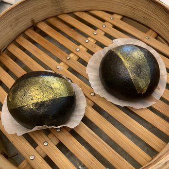 Supreme Dumplings - Charcoal Gold Lava Custard Bun W/ Gold Flakes - Shanghainese Near Me - Bellevue, Washington Supreme Dumplings - Charcoal Gold Lava Custard Bun W/ Gold Flakes - Shanghainese Near Me - Bellevue, Washington