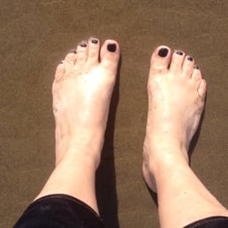 These are my toes in the Pacific Ocean after I had my mani pedi with Helena!