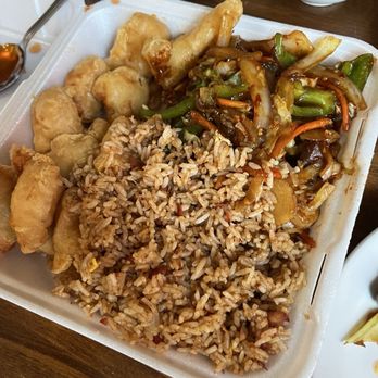 New Chinese Cuisine - Szechuan beef dinner plate with sweet-and-sour chicken and pork fried rice - Chinese Near Me - Forest Grove, Oregon