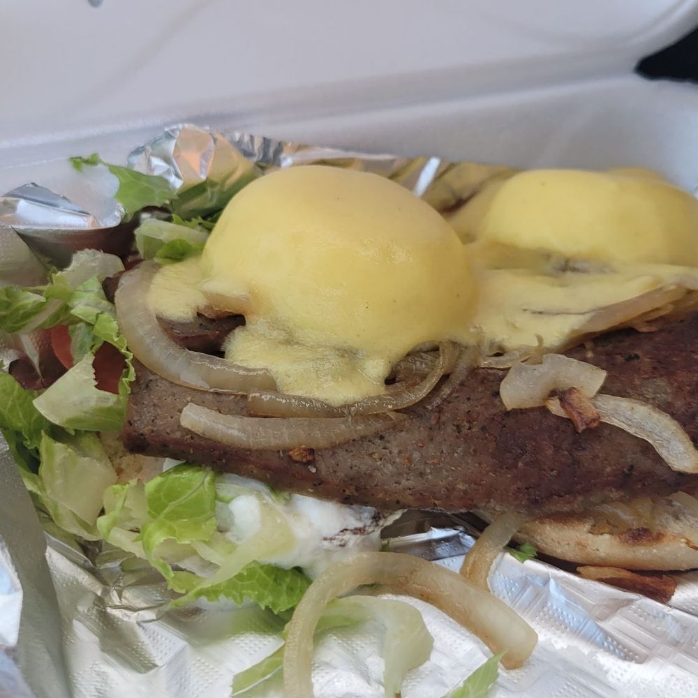Center Street Nook - GYRO BENEDICT: I will definitely fault Emilee for calling it a "JA-EYE-ROW," but 2 eggs, holandaise, tzaziki, gyro meat, and veggies. - Breakfast & Brunch Near Me - Jupiter, Florida Center Street Nook - GYRO BENEDICT: I will definitely fault Emilee for calling it a "JA-EYE-ROW," but 2 eggs, holandaise, tzaziki, gyro meat, and veggies. - Breakfast & Brunch Near Me - Jupiter, Florida