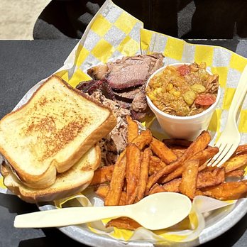 Sandfly BBQ - Two meat combo, Brunswick Stew - Cup, Beef Brisket, Pulled Pork Plate, Sweet Potato Fries and extra bread. - Barbeque Near Me - Savannah, Georgia Sandfly BBQ - Two meat combo, Brunswick Stew - Cup, Beef Brisket, Pulled Pork Plate, Sweet Potato Fries and extra bread. - Barbeque Near Me - Savannah, Georgia