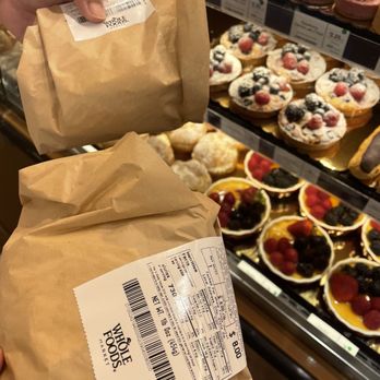 WFM Coffee & Juice Bar - a person holding a bag of food - Juice Bars & Smoothies Near Me - Tustin, California WFM Coffee & Juice Bar - a person holding a bag of food - Juice Bars & Smoothies Near Me - Tustin, California