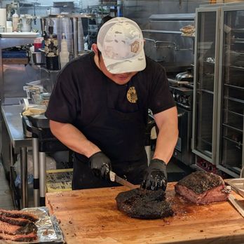 Fikscue Craft BBQ - Brisket being sliced for an order - Barbeque Near Me - Alameda, California