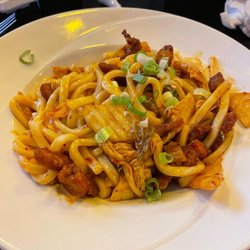 Taisho Bistro Japanese Restaurant - Kimchi udon w crispy pork...photo by @phil_eatsfood