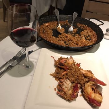 Can Majó - Glass of Rioja with the lobster Paella for two - Spanish Near Me - Barcelona, B Can Majó - Glass of Rioja with the lobster Paella for two - Spanish Near Me - Barcelona, B