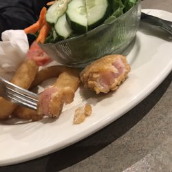 Smitty's Family Restaurant - Raw chicken fingers that were served.