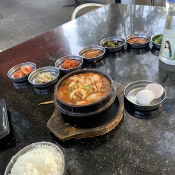 Spoon - Beef tofu soup with side dishes - Korean Near Me - Berkeley, California