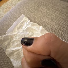 All of the nails have bubbling or dents in the polish All of the nails have bubbling or dents in the polish