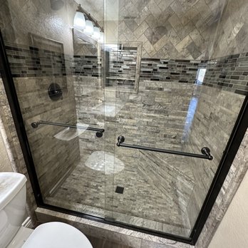 N & N Construction - a shower with a glass door - Handyman Near Me N & N Construction - a shower with a glass door - Handyman Near Me