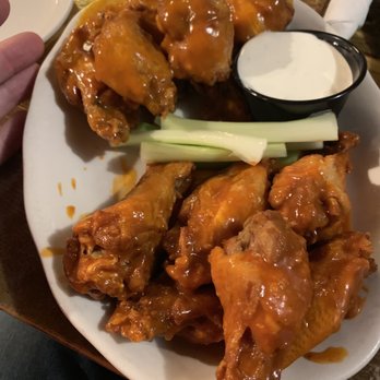 Packy's Pub - a plate of chicken wings with dipping sauce - Pubs Near Me - Washington Mills, New York Packy's Pub - a plate of chicken wings with dipping sauce - Pubs Near Me - Washington Mills, New York