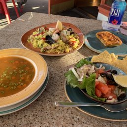 Shrimp soup, paella, ceviche and corn pie