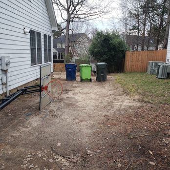 Bella's Tree & Landscaping - a back yard with trash cans - Tree Services Near Me - Raleigh, North Carolina Bella's Tree & Landscaping - a back yard with trash cans - Tree Services Near Me - Raleigh, North Carolina