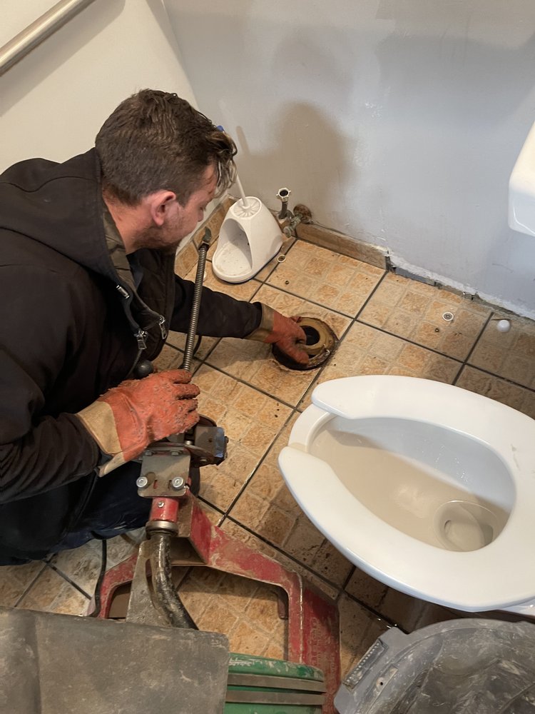 Slide of Suburban Plumbing Experts