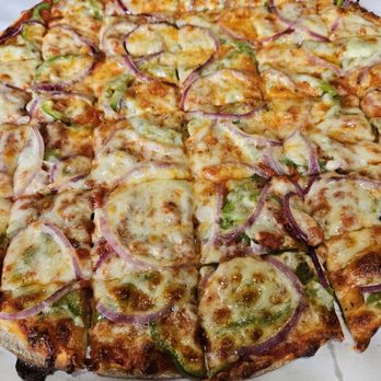 Jakeeno's Pizza & Pasta - Thin crust pizza with green peppers and red onion. - Pizza Near Me - Minneapolis, Minnesota
