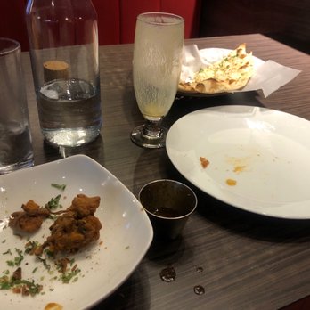 Pakwan Indian restaurant and bar - All that's left of the delicious pakoda and garlic naan. - Indian Near Me - Colorado Springs, Colorado Pakwan Indian restaurant and bar - All that's left of the delicious pakoda and garlic naan. - Indian Near Me - Colorado Springs, Colorado