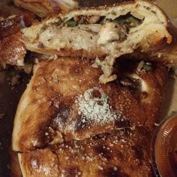 Dante's Pizzeria & Grille - Steak calzone with Italian sausage and pepperoni.