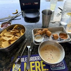 Chips and Queso and Fried Macaroni Balls.