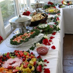 Nancy's Fancy's Cakes & Catering - Another view of heavy horduerves for wedding reception with fruit in the foreground~