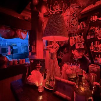 Kaona, The Hidden Tiki Room - Tiki decor abounds. This hula dancer lamp is a classic! - Speakeasies Near Me - Miami, Florida Kaona, The Hidden Tiki Room - Tiki decor abounds. This hula dancer lamp is a classic! - Speakeasies Near Me - Miami, Florida