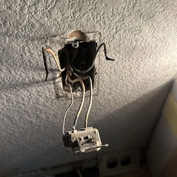 Mike The Handyman - Wires that had partially burned inside the wall outlet. - Electricians Near Me - Fontana, California Mike The Handyman - Wires that had partially burned inside the wall outlet. - Electricians Near Me - Fontana, California
