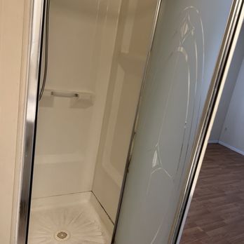 MZ Pro Home Improvements - Before picture of the smaller shower. - General Contractors Near Me - San Bernardino, California