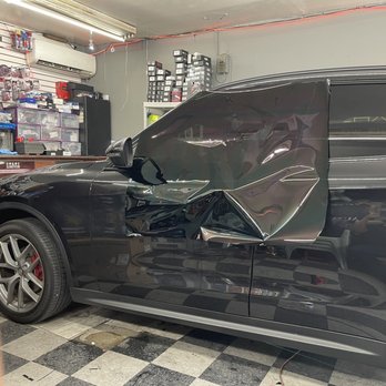Mike Car Stereo Tints - Front driver side getting 5% premium tint - Car Window Tinting Near Me - Woodside, New York