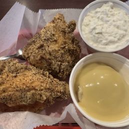 Two-piece fried chicken meal - breast and thigh (my choice). Mashed potatoes and gravy, and cottage cheese. Two-piece fried chicken meal - breast and thigh (my choice). Mashed potatoes and gravy, and cottage cheese.