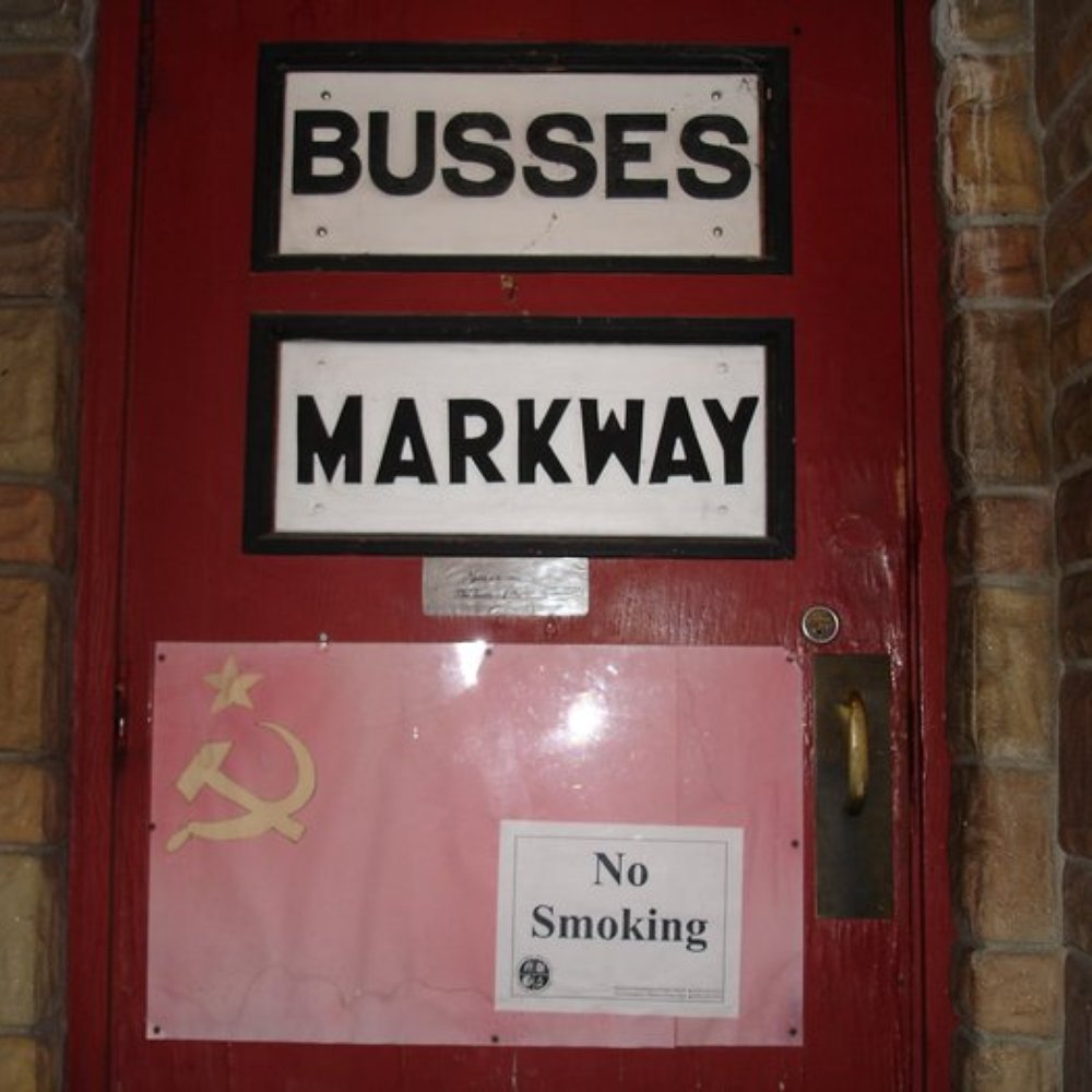 Busse's Markway Tavern - The front door of Busse's Markway- the flag was put up after the smoking ban, heh. I think it's gone now, though... too bad. :) - Bars Near Me - Madison, Wisconsin Busse's Markway Tavern - The front door of Busse's Markway- the flag was put up after the smoking ban, heh. I think it's gone now, though... too bad. :) - Bars Near Me - Madison, Wisconsin