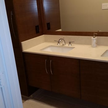 Verbeke Construction Company - Quarter sawn oak vanity, linen and mirror frame. - General Contractors Near Me Verbeke Construction Company - Quarter sawn oak vanity, linen and mirror frame. - General Contractors Near Me