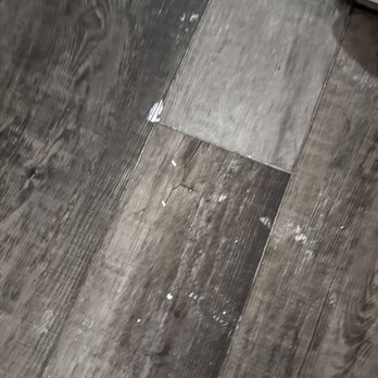 Fogarty Home Solutions - No protection for flooring outside the room, paint tracked all over - Handyman Near Me