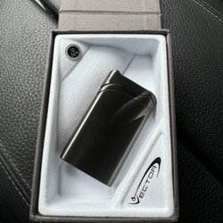 Monmouth Smoke Shop - Lighter in box with msrp sticker
