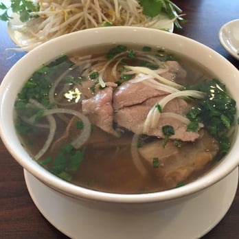 VN Pho - P-2 combination Pho. Topped with round steak, brisket, bible tripe. This is the small bowl, they also have a large option. - Vietnamese Near Me - Montgomery, Alabama VN Pho - P-2 combination Pho. Topped with round steak, brisket, bible tripe. This is the small bowl, they also have a large option. - Vietnamese Near Me - Montgomery, Alabama