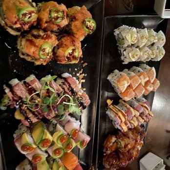 O-Ku - Salmon and Lemon Roll Tuna Tataki Roll Potato Roll  Playboy roll  Rainbow Roll Surf & Turf Roll Hokkaido Roll - Sushi Bars Near Me - Charleston, South Carolina