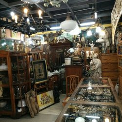 Unang Panahon - If your looking to buy or to sell your antique jewelry,  furniture or objects of art. They also do restorations.