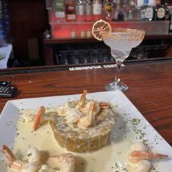 El Viejo Yayo Restaurant - My go-to order on a Friday is shrimp mofongo with garlic sauce, paired with a margarita on the rocks.