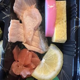 The hamster-sized piece of salmon in the bento The hamster-sized piece of salmon in the bento