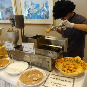 Perona Farms - Employee with his Halloween afro wig at the fresh donut station. All the fresh donuts fall into the bowl on the right side! - Venues & Event Spaces Near Me - Andover, New Jersey Perona Farms - Employee with his Halloween afro wig at the fresh donut station. All the fresh donuts fall into the bowl on the right side! - Venues & Event Spaces Near Me - Andover, New Jersey