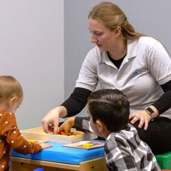 Behavior Frontiers Autism Center - A Behavior Frontiers behavior analyst works 1:1 with a child at our Riverside ABA clinic.