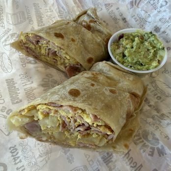 Salsitas Tacos Al Carbón - Breakfast Burrito with Mexican Ham (jamon). It was delicious but they charge 5.29$ for the small side of guacamole, which disappointed me. - Tacos Near Me - Phoenix, Arizona Salsitas Tacos Al Carbón - Breakfast Burrito with Mexican Ham (jamon). It was delicious but they charge 5.29$ for the small side of guacamole, which disappointed me. - Tacos Near Me - Phoenix, Arizona