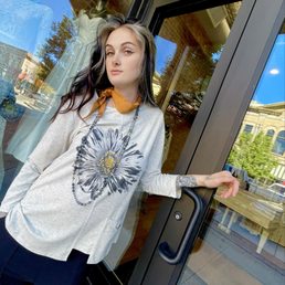 Exterior outside entrance of Tailored West - Daisy Drop Shoulder Tunic Top - Multi - Canon City, Colorado Exterior outside entrance of Tailored West - Daisy Drop Shoulder Tunic Top - Multi - Canon City, Colorado