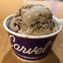 a cup of ice cream on a table