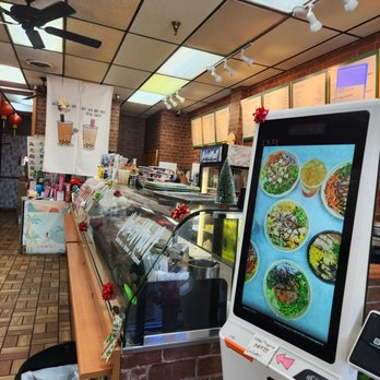 PoKeMaN - a display of food in a restaurant - Poke Near Me - Plantation, Florida PoKeMaN - a display of food in a restaurant - Poke Near Me - Plantation, Florida