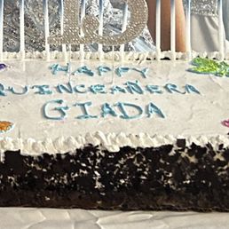 "Professionally decorated" cake - the butterflies were also supposed to be baby blue.