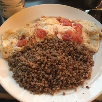 Veselka - Egg white omelette with feta, tomatoes and onions complimented by kasha grain - Ukrainian Near Me - New York, New York Veselka - Egg white omelette with feta, tomatoes and onions complimented by kasha grain - Ukrainian Near Me - New York, New York